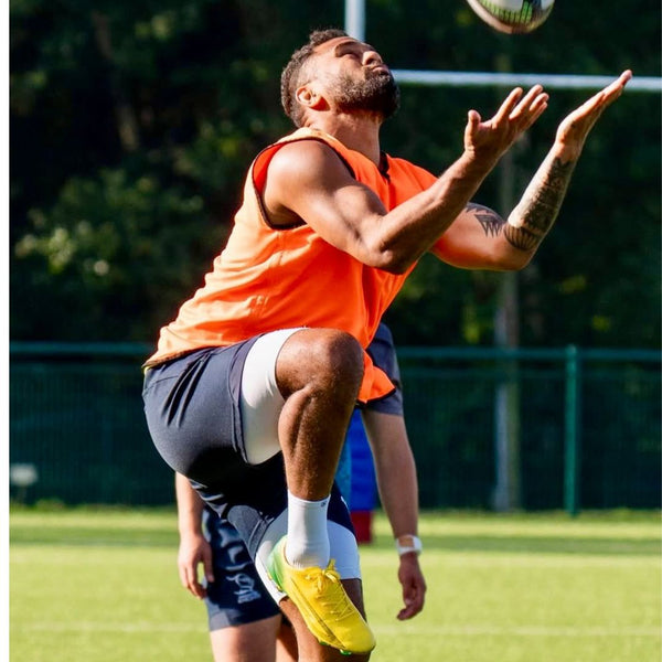 Athlete wearing NXTWAVE grip socks